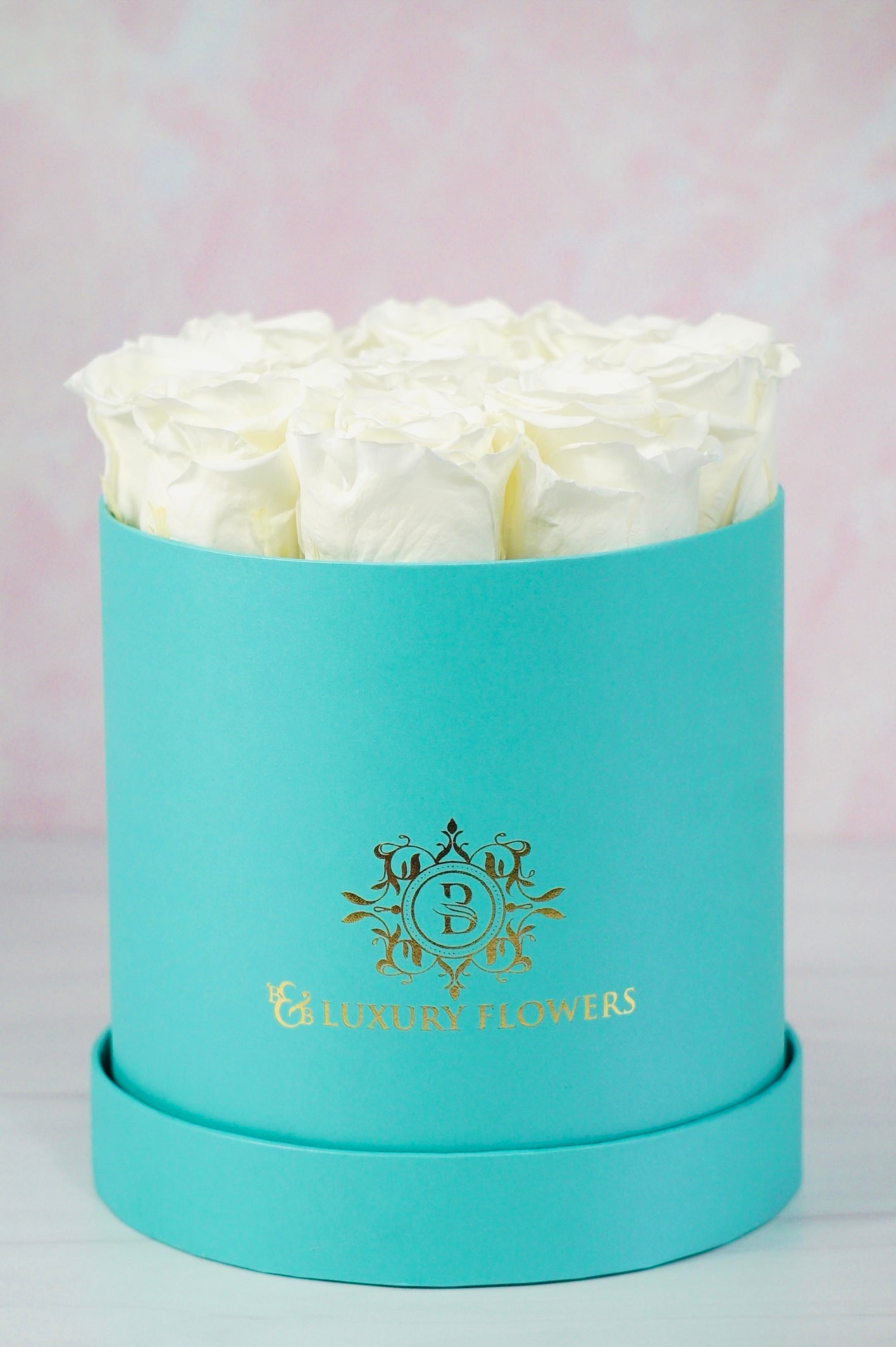 Round Elegance: 9 Preserved Roses Box
